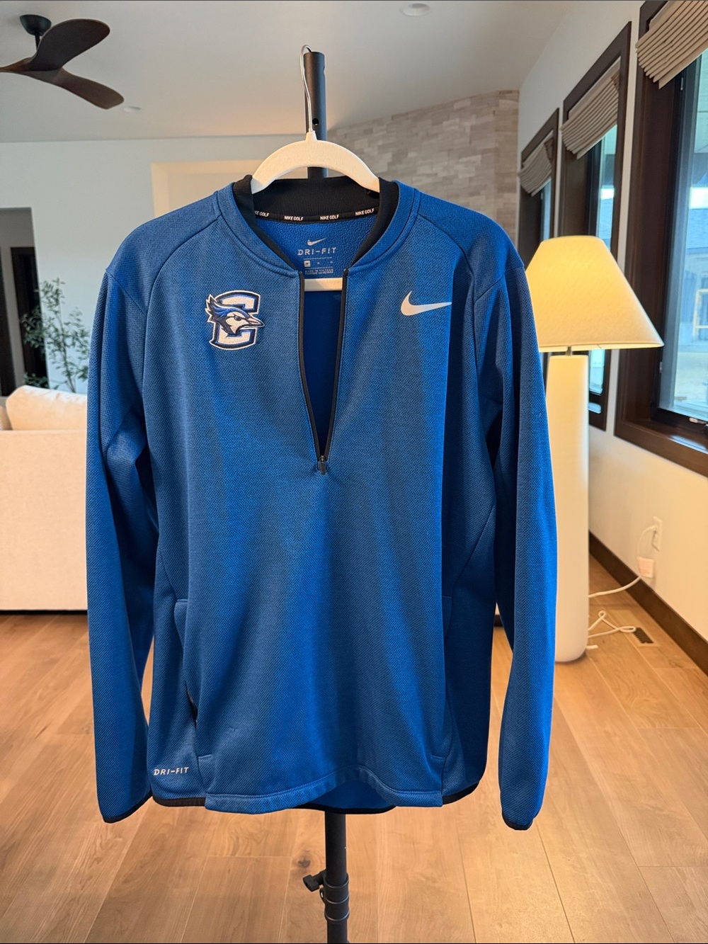 Nike Creighton Royal Blue Dri-FIT Quarter-Zip Pullover with Team Patch